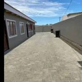 Modern complex flat interior Naraville Walvis Bay open-plan kitchen 2 bedroom complex flat Johanna Fleermuis Palm Valley Naraville